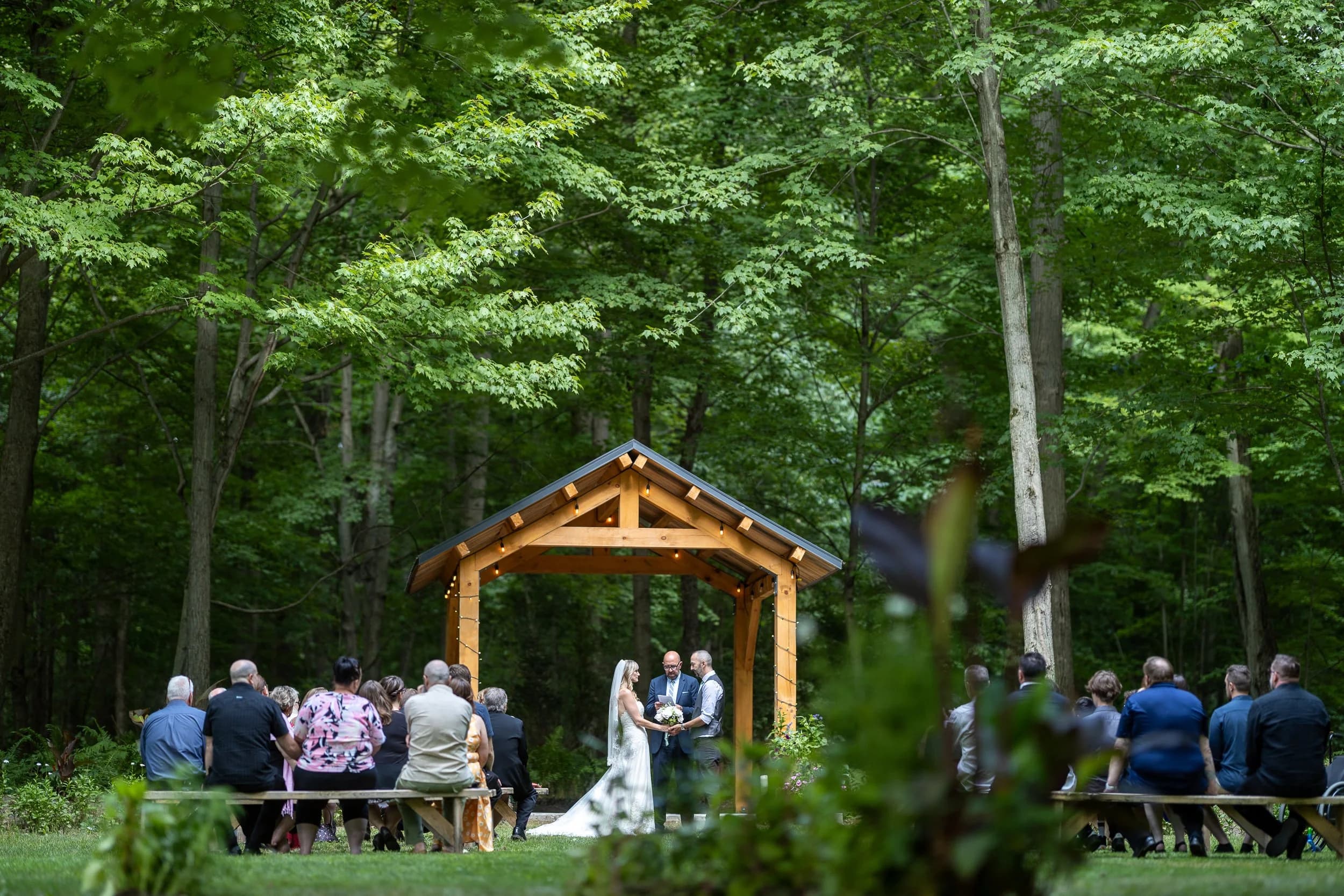 Couple walking through the forest at Fernwood Hills