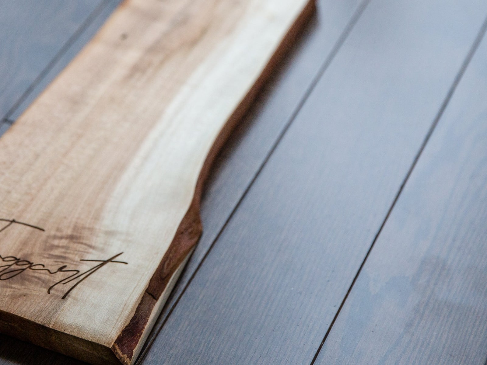 Live edge and finished surface detail on a Fernwood serving board